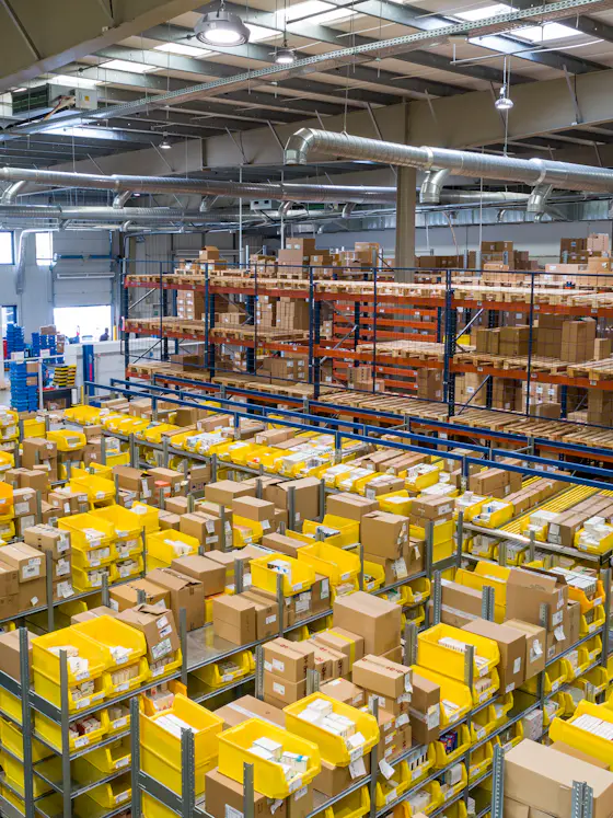 Distribution warehouse with parcels racked for dispatch